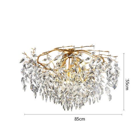 precision cut leaf crystal chandelier with gold branches 55 cm high by 85 cm wide