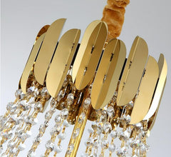 Close up detail of crystal beads and gold decoration at top of fixture