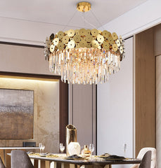 round crystal chandelier with gold discs in dining room