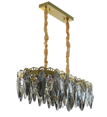 oval shaped crystals on oval chandelier with gold finish