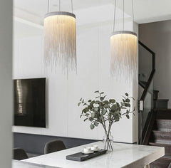 two pendant lights over dining room table silver