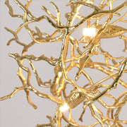 gold branch chandelier body illuminated