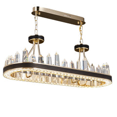 oval gold chandelier with leather bank and obelisk shaped crystals