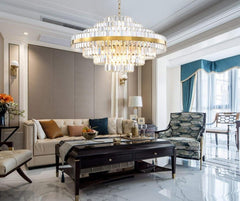 round tiered crystal gold chandelier in living room
