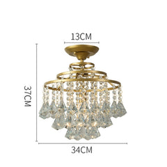 crystal and gold chandelier 34 cm diameter by 37 cm high