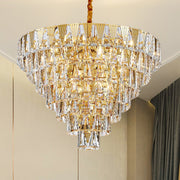 gold conical crystal chandelier illuminated