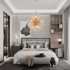 crystal dandelion gold chandelier over gray and white bedroom set