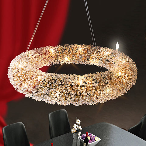 round crystal floral chandelier illuminated dining area