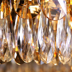 detail shot of champagne crystals layered atop clear crystals on fixture