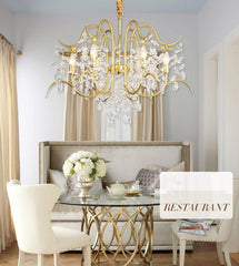 gold and crystal chandelier in dining space