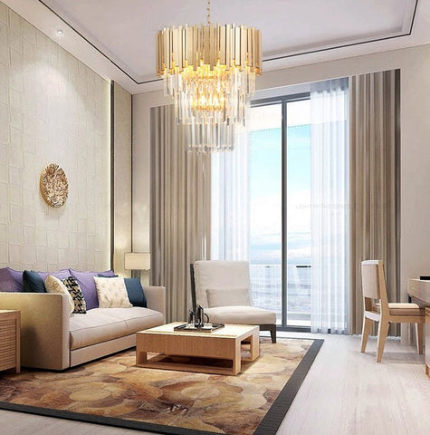 gold and crystal conical chandelier hanging in apartment