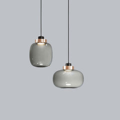 two glass minimalist lights with copper base with cord suspension