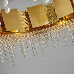 golden round chandelier with crystal drops detail
