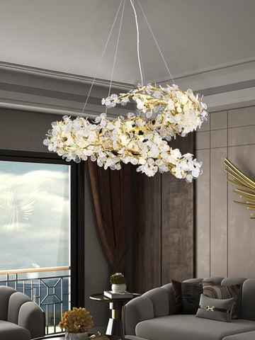 frosted shell gold branch chandelier hanging in living room