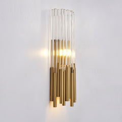 gold and clear crystal tubular wall sconce illuminated side view